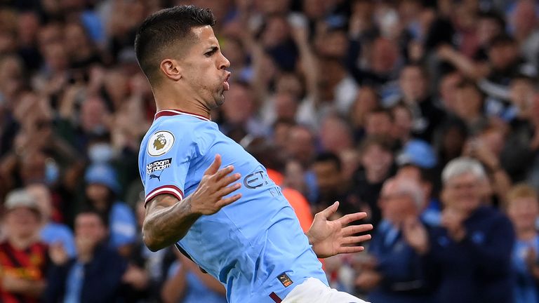 Joao Cancelo celebrates after scoring Man City's fourth goal against Nottingham Forest