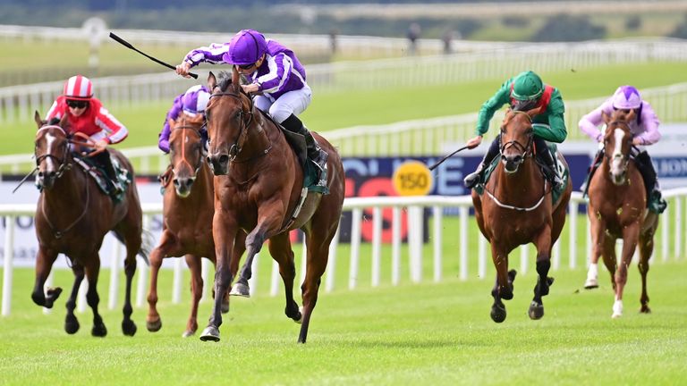 Little Big Bear and Ryan Moore win the Keeneland Phoenix Stakes