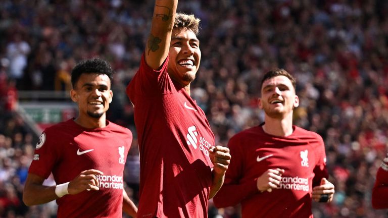 Roberto Firmino celebrates after scoring Liverpool&#39;s fourth goal against Bournemouth