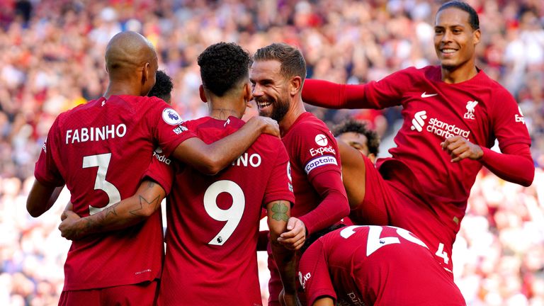 Liverpool players celebrate Roberto Firmino's second goal against Bournemouth