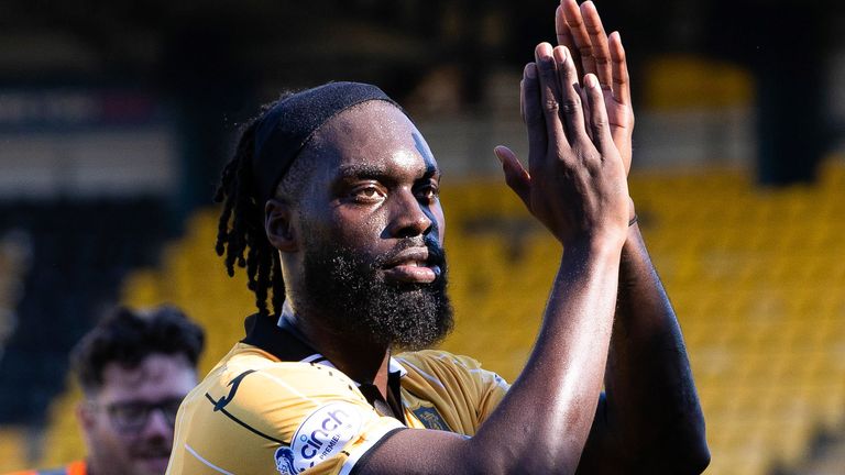 LIVINGSTON, SCOTLAND - AUGUST 13: Livingston's Ayo Obileye at full time applauds the fans during a cinch Premiership match between Livingston and Hibs at the Tony Macaroni Arena, on August 13, 2022, in Livingston, Scotland. (Photo by Alan Harvey / SNS Group)