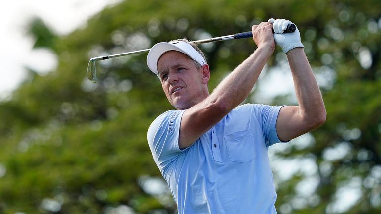 Luke Donald plays his shot from the 11th tee during the first round of the Sony Open golf tournament