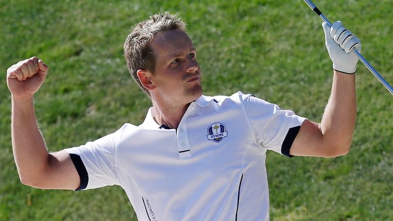 Europe&#39;s Luke Donald reacts after hitting out of a bunker on the 17th hole during a singles match at the Ryder Cup PGA golf tournament Sunday, Sept. 30, 2012, at the Medinah Country Club in Medinah, Ill. The hole gave Donald a win in the match over USA&#39;s Bubba Watson. (AP Photo/David J. Phillip) 