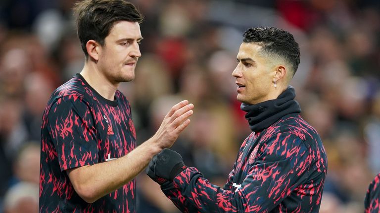 Manchester United&#39;s Harry Maguire (left) and Cristiano Ronaldo (right)