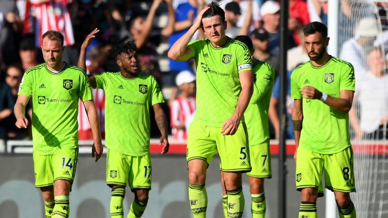 Manchester United players show their frustration during a dismal first-half performance at Brentford