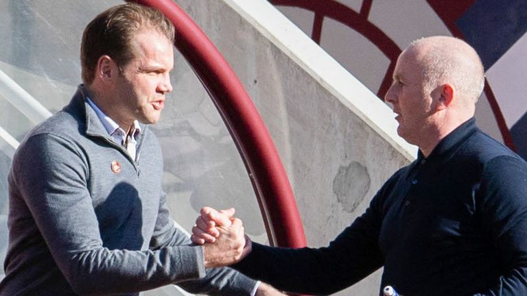 Robbie Neilson (left) will take Hearts to face David Martindale's Livingston on Saturday