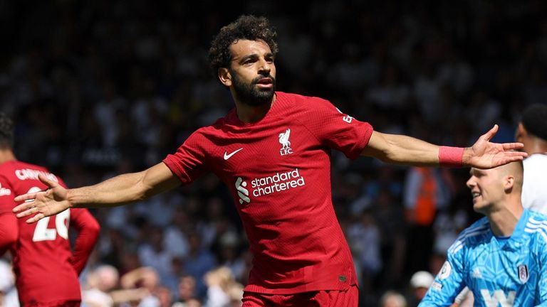 Mohamed Salah celebrates after scoring Liverpool's second goal (AP)