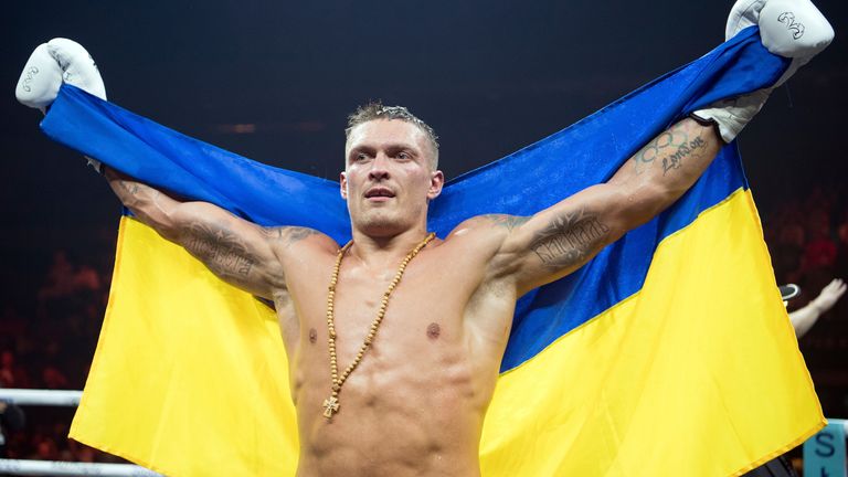 Oleksandr Usyk is a proud Ukranian national, pictured here celebrating after his victory against Marco Huck