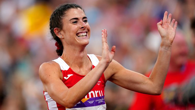 Olivia Breen of Wales celebrates after winning the T37/38 women's 100 m final at the Commonwealth Games