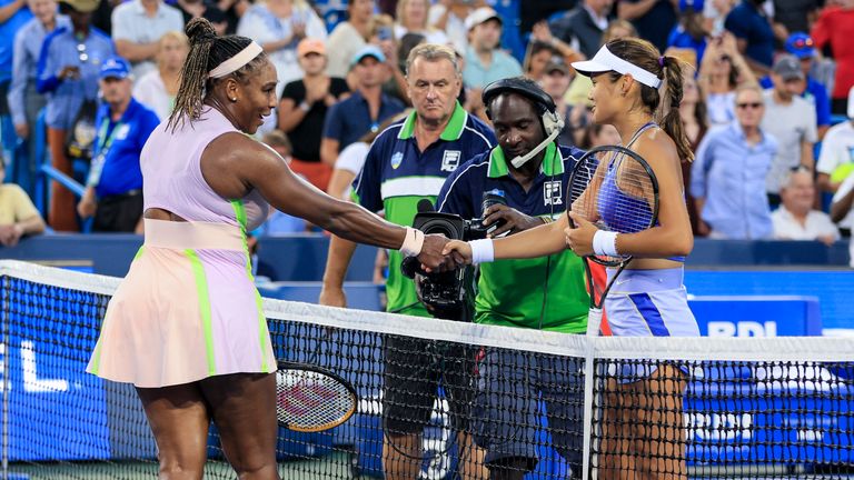 Serena Williams, left, of the United States, shakes hands with Emma Raducanu, of Britain, after their match during the Western & Southern Open tennis tournament Tuesday, Aug. 16, 2022, in Mason, Ohio. Raducanu won 6-4, 6-0