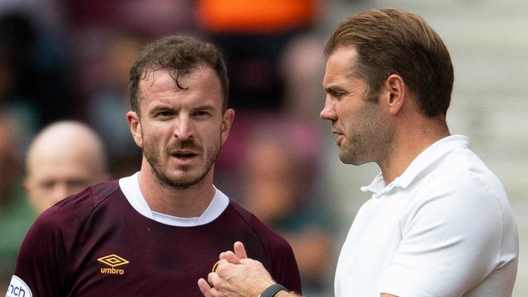EDINBURGH, SCOTLAND - AUGUST 14: Hearts&#39; manager Robbie Neilson talks to Andy Halliday (L) during a cinch Premiership match between Heart of Midlothian and Dundee United at Tynecastle, on August 14, 2022, in Edinburgh, Scotland. (Photo by Mark Scates / SNS Group)