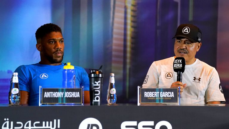 Anthony Joshua (left) and Robert Garcia during a press conference at the Shangri-La Hotel in Jeddah, Saudi Arabia.  Date taken: Wednesday, August 17, 2022.