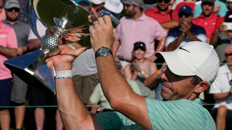 Rory McIlroy, of Northern Ireland, celebrates his victory during the final round of the Tour Championship golf tournament at East Lake Golf Club, Sunday, Aug. 28, 2022, in Atlanta. (AP Photo/Steve Helber)
