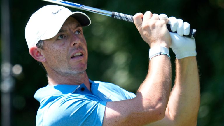 Rory McIlroy, of Northern Ireland, watches his shot on the second tee during the third round of the Tour Championship golf tournament at East Lake Golf Club Saturday, Aug. 27, 2022, in Atlanta. (AP Photo/Steve Helber)