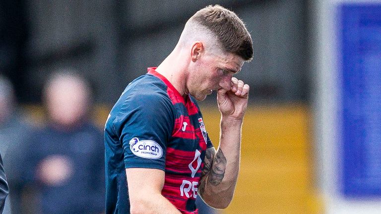Ross County's Ross Callachan walks off after being sent off against  Kilmarnock