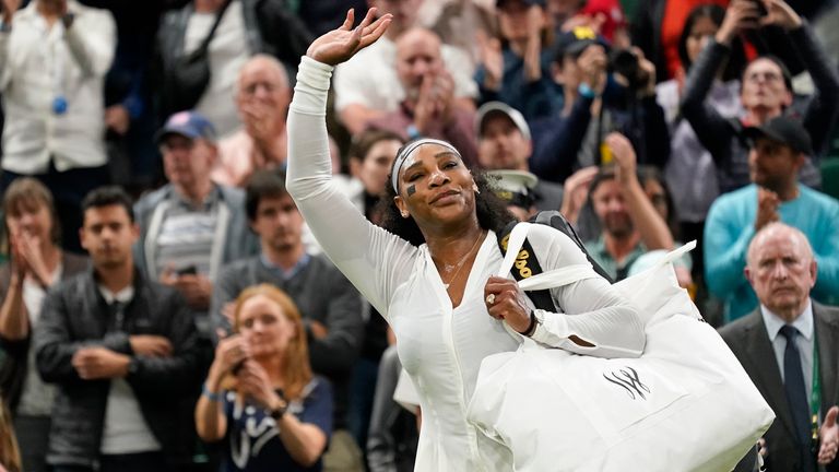 Serena Williams waves as she leaves the court after losing to France&#39;s Harmony Tan in a first round women&#39;s singles match on day two of the Wimbledon tennis championships in London, Tuesday, June 28, 2022.