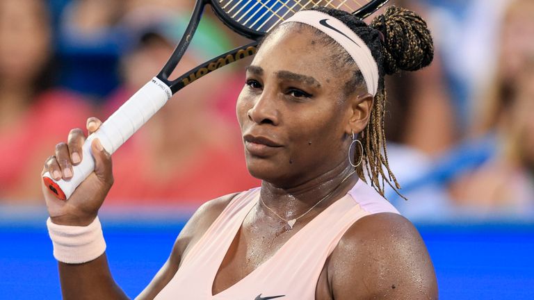 Serena Williams, of the United States, reacts after losing a point to Emma Raducanu, of Britain, during the Western & Southern Open tennis tournament, Tuesday, Aug. 16, 2022, in Mason, Ohio. (AP Photo/Aaron Doster)