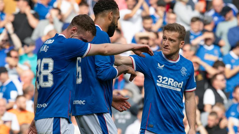 GLASGOW, SCOTLAND - AUGUST 27: Rangers' Steven Davis (R) celebrates making it 4-0 during a cinch Premiership match between Rangers and Ross County at Ibrox Stadium, on August 27, 2022, in Glasgow, Scotland.  (Photo by Rob Casey / SNS Group)