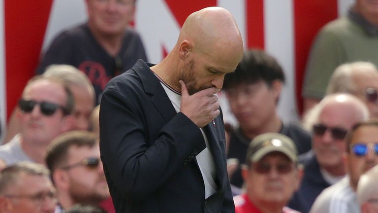 Manchester United manager Erik ten Hag looks down on the touchline during Sunday's defeat to Brighton.