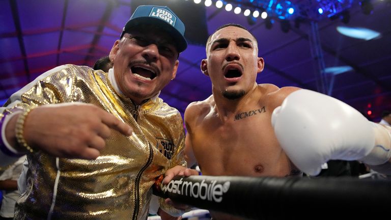 Teofimo Lopez, right, celebrates with his dad Teofimo Lopez Sr. after defeating Pedro Campa