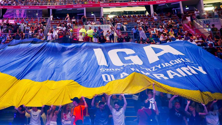 Spectators hold a huge Ukrainian flag during the event & # 39;  Iga Swiatek & Friends for Ukraine & # 39;  charity event at Tauron Arena in Krakow, Poland on July 23, 2022. The total income from ticket sales, PLN 2 million (EUR 422,000), will be donated to children affected by the war. war in Ukraine.  (Photo by Beata Zawrzel / NurPhoto)