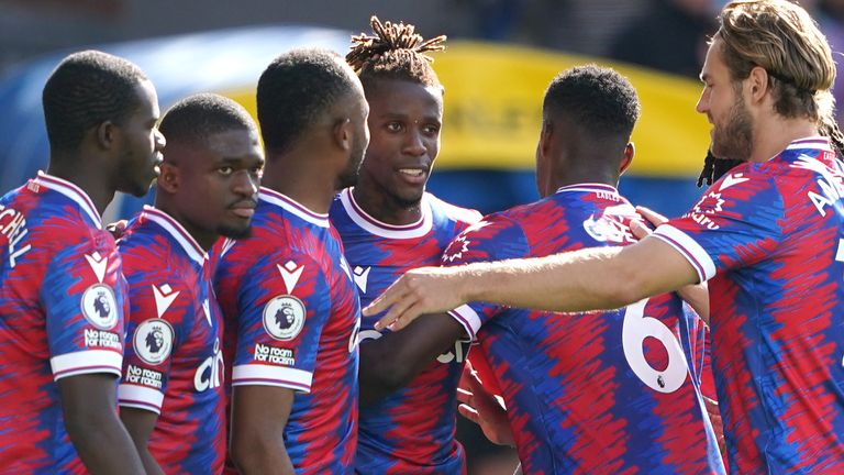 Wilfried Zaha celebrates his second goal with team-mates