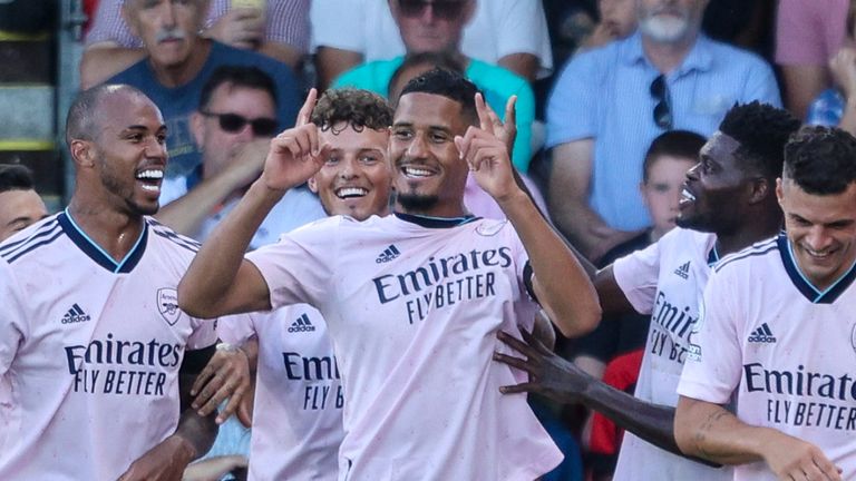 William Saliba celebrates with team-mates after making it 3-0
