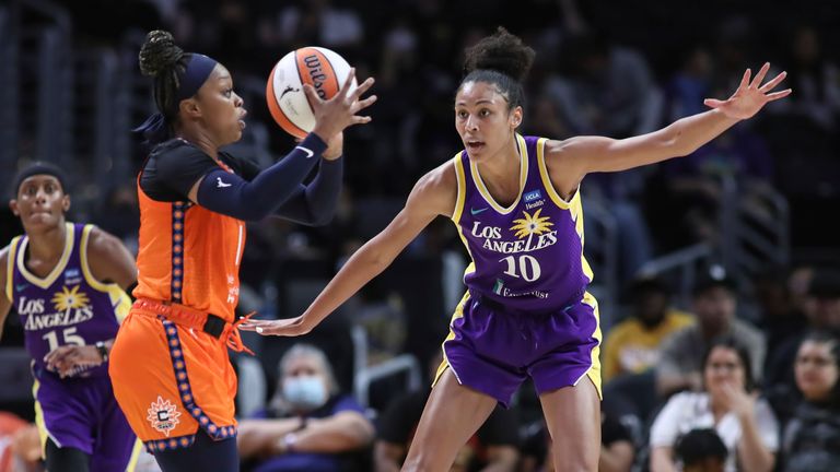 Los Angeles Sparks forward Olivia Nelson-Ododa (10) guarding Connecticut Sun guard Odyssey Sims (1) during the Connecticut Sun game versus the Los Angeles Sparks, on August 9, 2022, at Crypto.com Arena in Los Angeles, CA.