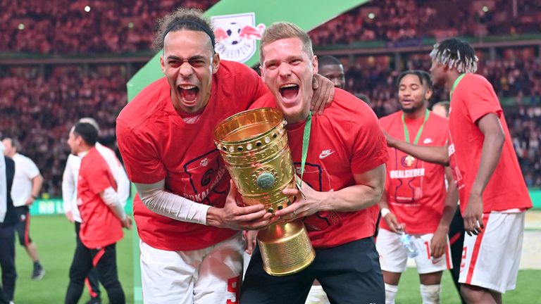 Yussuf Poulsen celebrates winning the German Cup with RB Leipzig