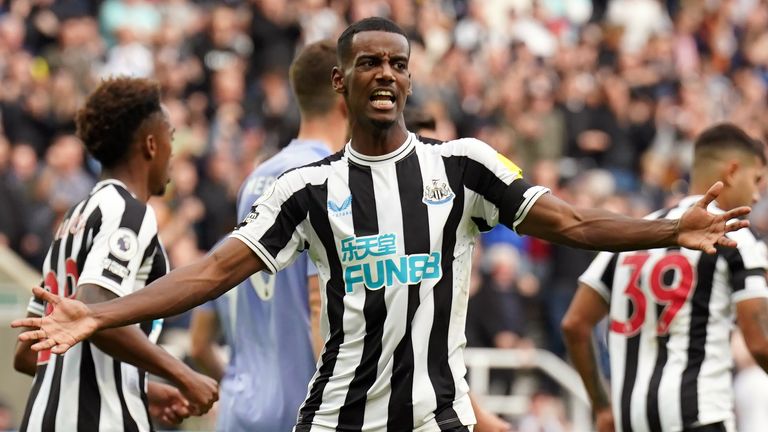 Alexander Isak celebrates scoring his penalty