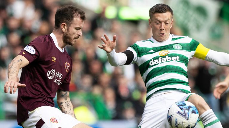 Hearts' Andy Halliday (L) and Celtic's Callum McGregor during a cinch Premiership match between Celtic and Hearts at Celtic Park, on August 21, 2022