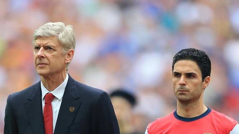 Manager Arsene Wenger and Mikel Arteta, Arsenal, stand with mascots prior to kick-off
