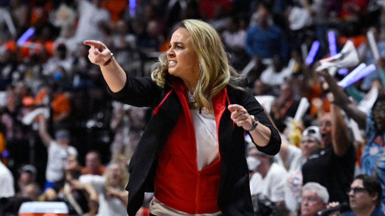 Las Vegas Aces head coach Becky Hammon reacts during the first half in Game 4 of a WNBA basketball final playoff series against the Connecticut Sun, Sunday, Sept. 18, 2022, in Uncasville, Conn. (AP Photo/Jessica Hill)