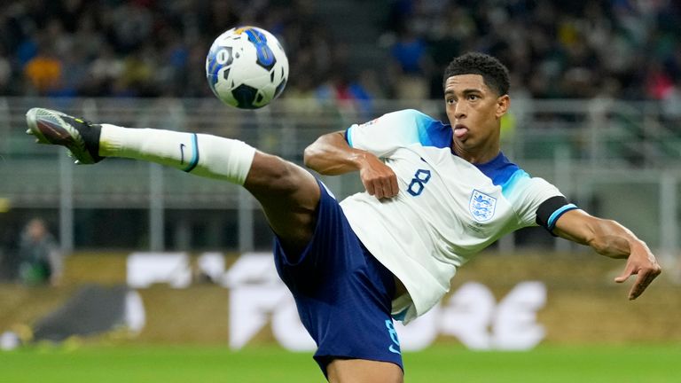 England's Jude Bellingham kicks the ball during the UEFA Nations League soccer match between Italy and England at the San Siro stadium, in Milan, Italy, Friday, Sept. 23, 2022. (AP Photo/Antonio Calanni)