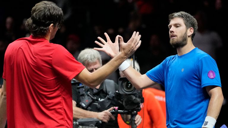 Team Europe&#39;s Cameron Norrie, of Britain, right, shakes hands with Team World&#39;s Taylor Fritz, of the United States, after a match on second day of the Laver Cup tennis tournament at the O2 in London, Saturday, Sept. 24, 2022. (AP Photo/Kin Cheung)