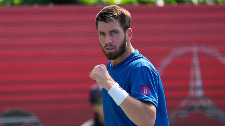 Cameron Norrie, of Britain, reacts after winning a point against Kaichi Uchida of Japan during the Korea Open tennis championships in Seoul, South Korea, Thursday, Sept. 29, 2022. 