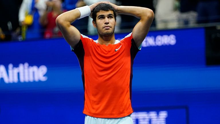 Carlos Alcaraz, of Spain, looks up at the fans after beating Jannik Sinner, of Italy, during the quarterfinals of the U.S. Open tennis championships, early Thursday, Sept. 8, 2022, in New York. (AP Photo/Frank Franklin II)