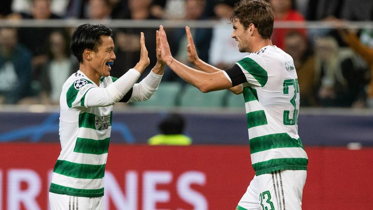 WARSAW, POLAND - SEPTEMBER 14: Celtic's Reo Hatate celebrates with Matt O'Riley as he makes it 1-0 during a UEFA Champions League match between FC Shakhtar Donetsk and Celtic at the Stadion Wojska Polskiego, on September 14, 2022, in Warsaw, Poland. (Photo by Craig Williamson / SNS Group)