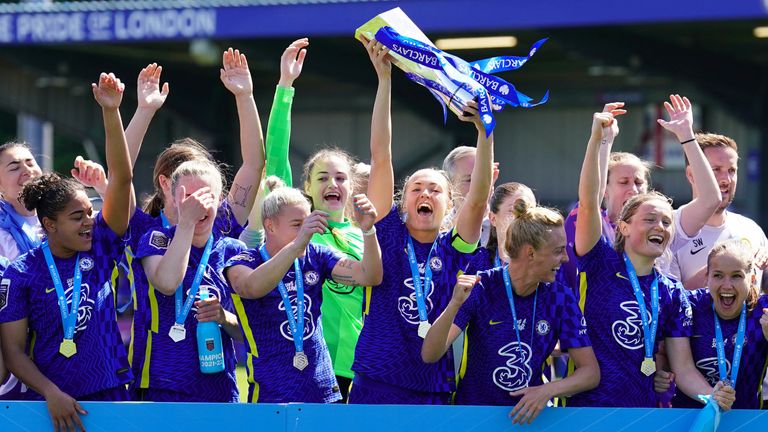 Chelsea's Magdalena Eriksson lifts the Barclays FA Women's Super League trophy after her side won the competition after the Barclays FA Women's Super League match at Kingsmeadow