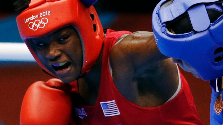 United States&#39; Claressa Shields RED fights Russia&#39;s Nadezda Torlopova BLUE in a women&#39;s middleweight 75-kg boxing gold medal match at the 2012 Summer Olympics, Thursday, Aug. 9, 2012, in London. (AP Photo/Patrick Semansky)