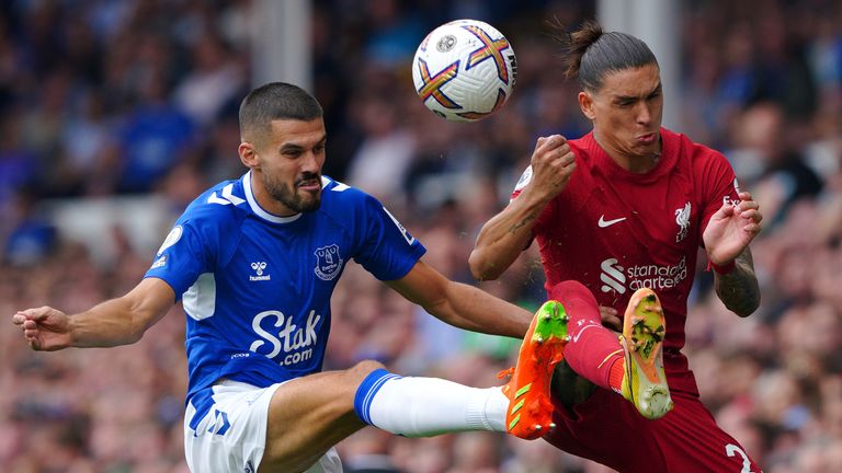 Everton&#39;s Conor Coady (left) and Liverpool&#39;s Darwin Nunez battle for the ball