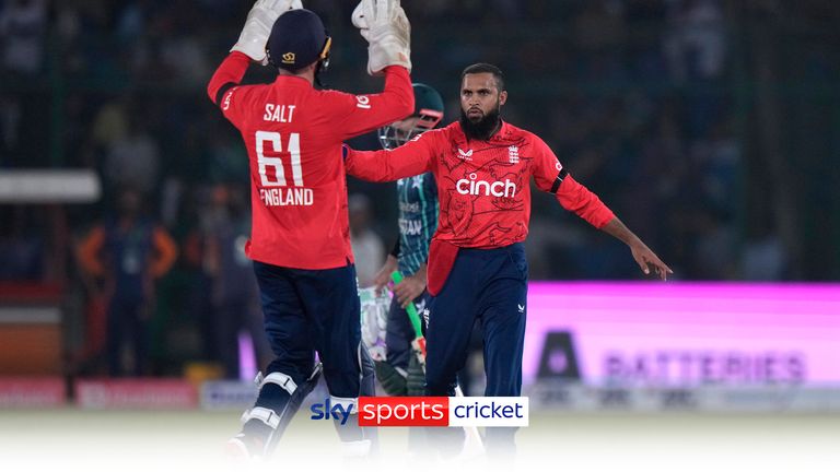 England&#39;s Adil Rashid, right, celebrates with teammates the dismissal of Pakistan&#39;s captain Babar Azam during the first T20 cricket match between Pakistan and England, in Karachi, Pakistan, Tuesday, Sept. 20, 2022.