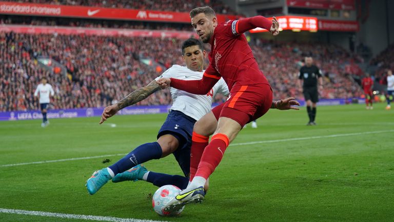 Romero challenges Liverpool&#39;s Jordan Henderson during last season&#39;s meeting at Anfield