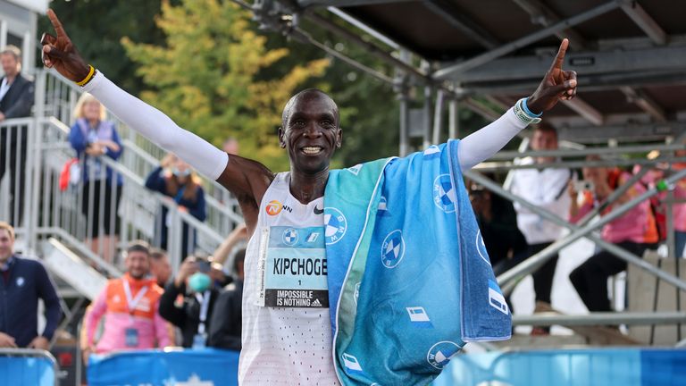 Kenya's Eliud Kipchoge celebrates after winning the Berlin Marathon in Berlin, Germany, Sunday, Sept. 25, 2022. Olympic champion Eliud Kipchoge has bettered his own world record in the Berlin Marathon. Kipchoge clocked 2:01:09 on Sunday to shave 30 seconds off his previous best-mark of 2:01:39 from the same course in 2018. (AP Photo/Christoph Soeder)