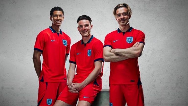 Jude Bellingham, Declan Rice and Jack Grealish pose in the new away kit (Credit: FA)