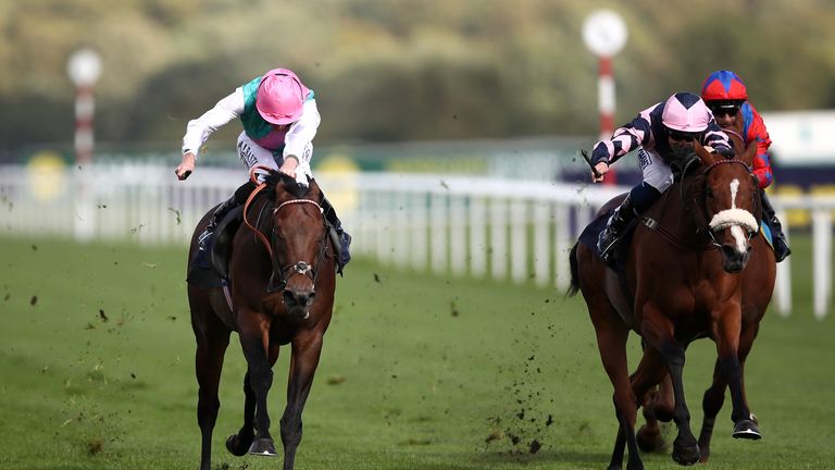 Equilateral and Ryan Moore on the way to winning the 2019 Scarbrough Stakes