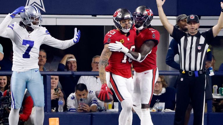 Mike Evans (centre) and Julio Jones (right) celebrate a late landing