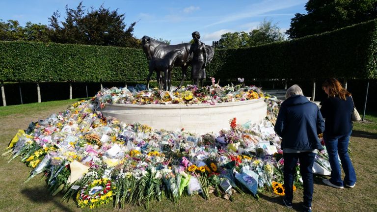 Flowers have been laid in Newmarket at a statue commemorating Queen Elizabeth II