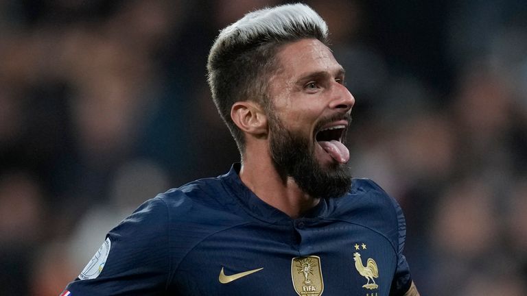 France's Olivier Giroud celebrates scoring his side's second goal during the UEFA Nations League soccer match between France and Austria at the Stade de France stadium in Saint Denis, outside Paris, France,Thursday, Sept. 22, 2022. (AP Photo/Christophe Ena)