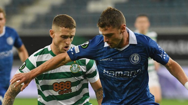 Gent's Hugo Cuypers, center, fights for the ball against Shamrock Rovers' Lee Grace, center left, during the Conference League Group F soccer match between Gent and Shamrock Rovers at the KAA Gent Stadium in Ghent, Belgium, Thursday, Sept. 15, 2022. (AP Photo/Fred Sierakowski)